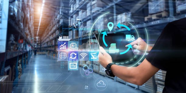 man hands using tablet on blurred warehouse as background